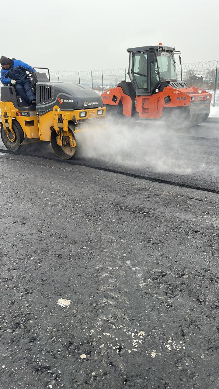 Уплотнение асфальта двумя катками с паром